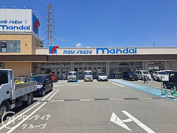 万代新庄花内店 徒歩20分。 1580m
