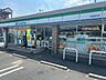 周辺：ファミリーマート 生駒俵口店（589m）