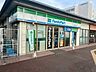 周辺：ファミリーマート 近鉄東生駒駅前店（369m）