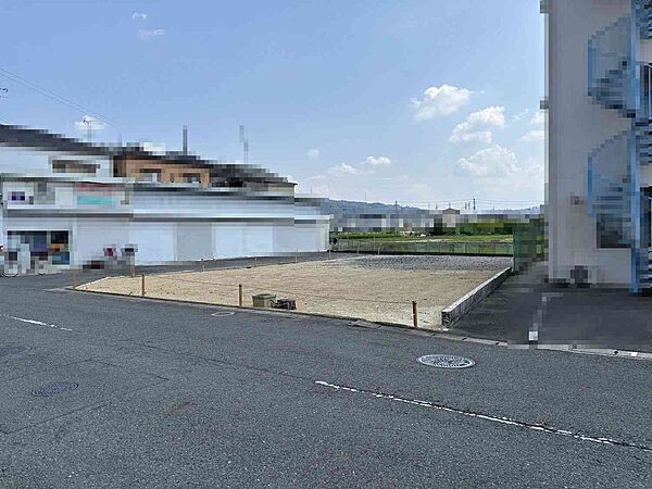 北西より