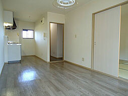 サンコリーナ穂高 A棟 201 1階2LDKのリビング/ダイニング