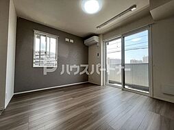 エスカレーズ 1階1LDKのリビング/ダイニング