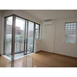 カーサ・デル・ソル小石川 205 1階ワンルームのリビング/ダイニング