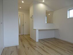 レフィナード小竹 203 2階ワンルームの寝室