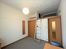 レオパレスサカグチ 1階1Kの寝室