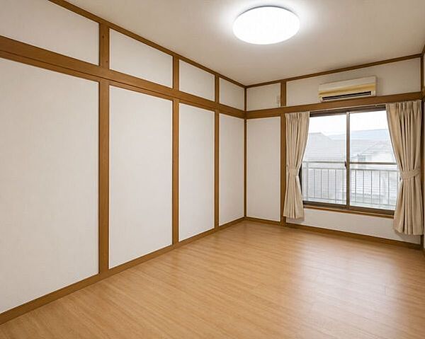 北側約8帖洋室。AIの加工にて室内家具一部を消去しています。