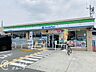 周辺：ファミリーマート寝屋川黒原橘町店 徒歩5分。 370m