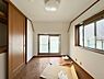 洋室：一日の疲れを癒やしてくれる主寝室。時を忘れて過ごす場所として過ごせるお部屋。