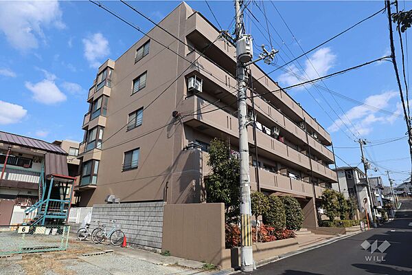 モンテベルデ豊中の外観（南西側から）。阪急宝塚線「服部天神」駅徒歩8分。1994年3月築。総戸数50戸の分譲マンションです。