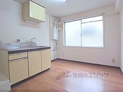 京都市営烏丸線 北大路駅 バス15分 釈迦谷口下車 徒歩4分の賃貸マンション 1階1DKのリビング/ダイニング