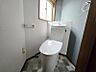 トイレ：清潔感のあるトイレットルーム