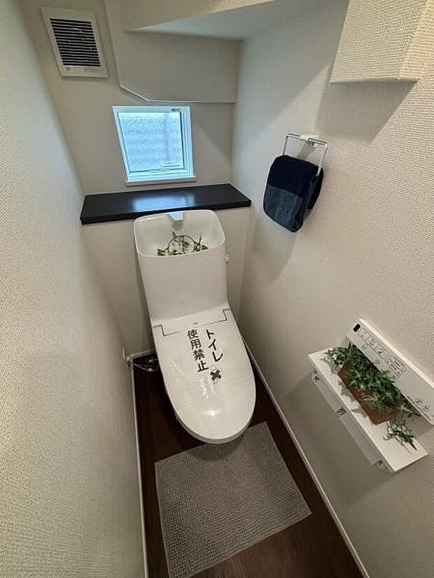 (1号棟) スタイリッシュでお掃除もしやすいお手洗い。必要な機能が揃っています。