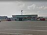 周辺：ファミリーマート 中間垣生店（1318m）