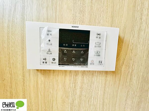 施工例写真　使いやすいシンプルな浴室パネル