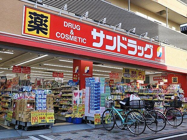 サンドラッグ小田銀座店 73m