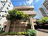 外観：流行に左右されず、将来にわたって価値が継続する「上質」な佇まい。（空の加工を生成AIで行っています）