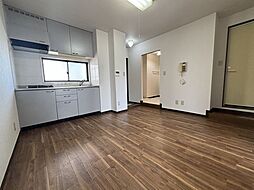 京成松戸線 三咲駅 徒歩7分の賃貸マンション 2階2DKのリビング/ダイニング