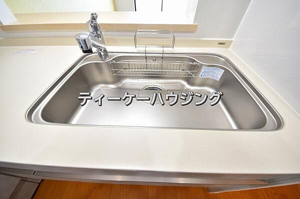 家族と触れ合いを大切にできる対面キッチンです。