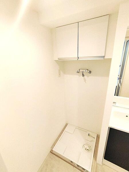洗濯機用防水パンは新規で交換されています。
