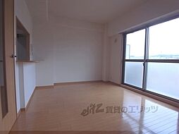 JR奈良線 城陽駅 徒歩4分の賃貸マンション 3階2LDKのリビング/ダイニング