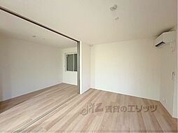 近鉄京都線 富野荘駅 徒歩5分の賃貸アパート 3階1LDKのリビング/ダイニング