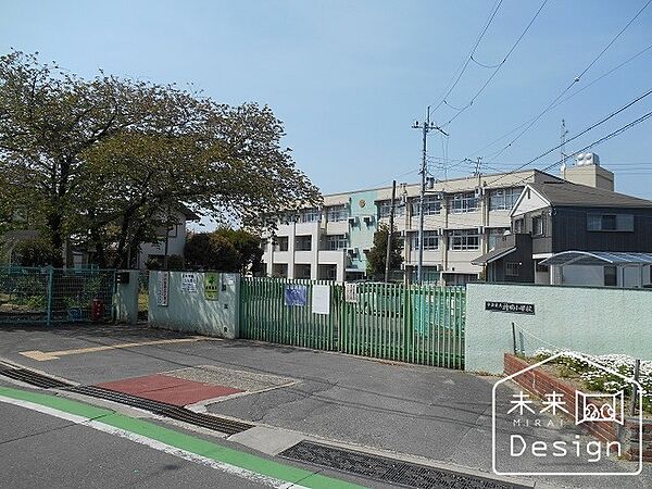 小学校「宇治市立神明小学校まで1069m」