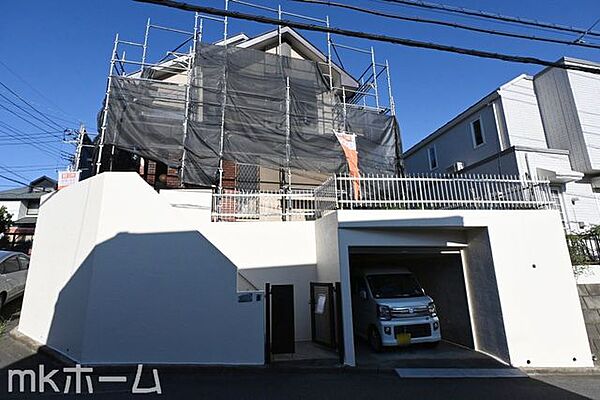 現在、外壁塗装工事中