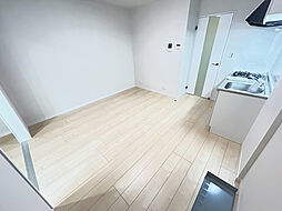 セブンプロートギオンクレスト 104 1階1LDKのリビング/ダイニング