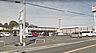 周辺：セブンイレブン 八幡楠橋南1丁目店（637m）