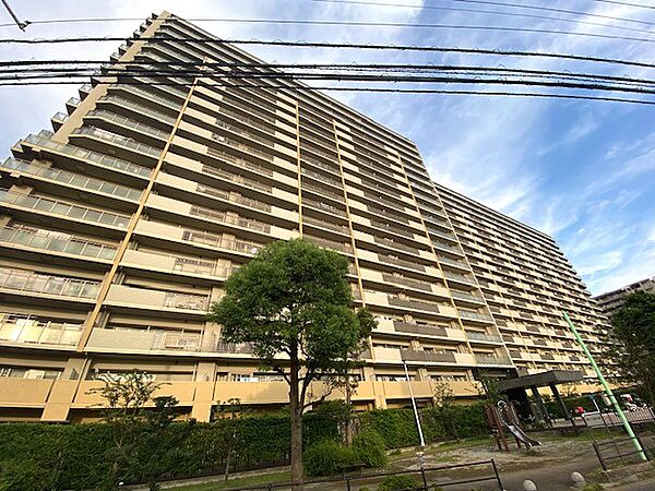 総戸数409戸　20階建て　タイル張りの外観