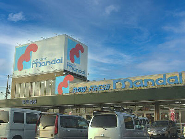 万代伊川谷店　約400ｍ