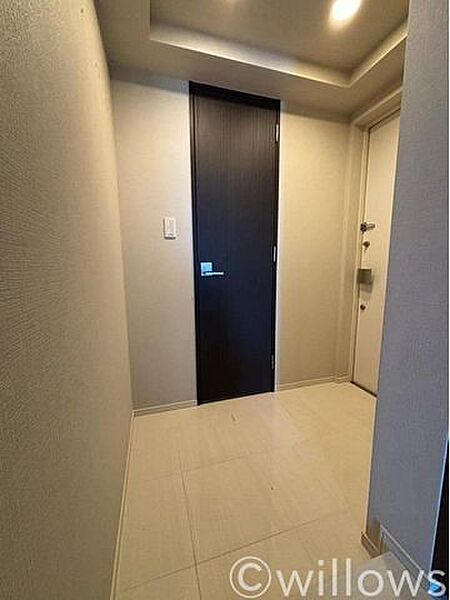 上質感漂う玄関です。ご家族の帰り、訪れる方を優しく迎える・安らぎに満ちた空間です。