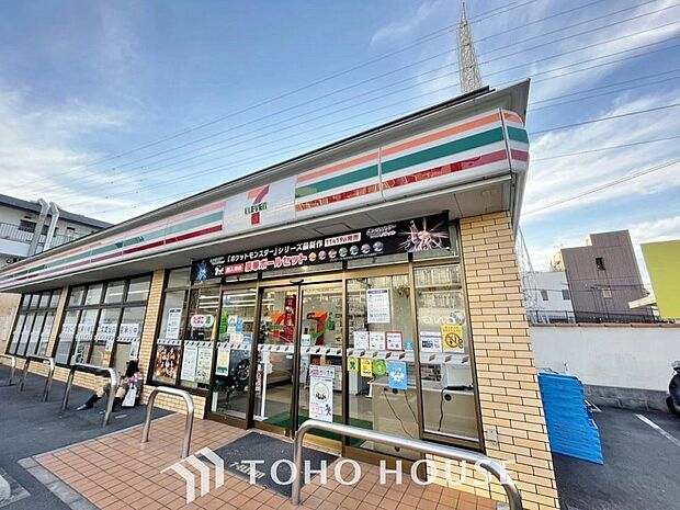 セブンイレブン足立花保南店まで約574m。