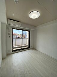 アシンメトリー三田 103 1階1Kのリビング/ダイニング