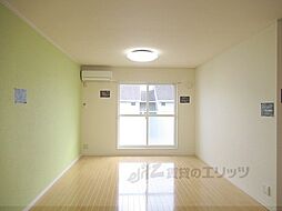 夢咲きの里　Ａ 1階1LDKのリビング/ダイニング