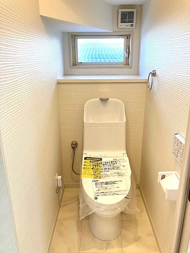 １階トイレ　温水洗浄付便座新規交換