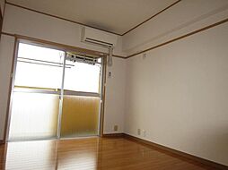 マンションピースフル 4階2Kのリビング/ダイニング