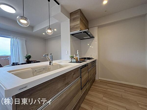 シンプルで使いやすい設計のキッチン。毎日の料理が快適に。