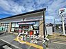 周辺：セブンイレブン伏見石田大山店 徒歩3分。 150m