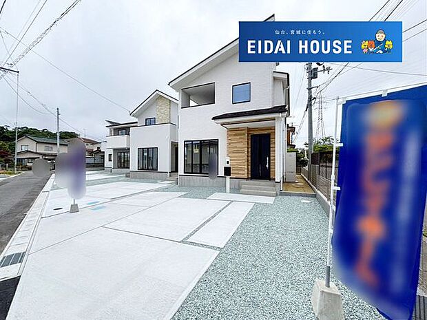 前面道路を含む現地外観写真