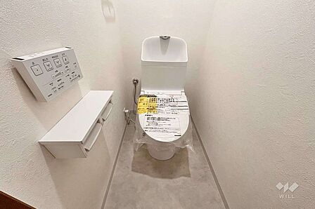 トイレです。温水洗浄便座機能付きです。
