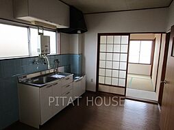 雄ノ湊ハイツ 302 3階2DKのリビング/ダイニング