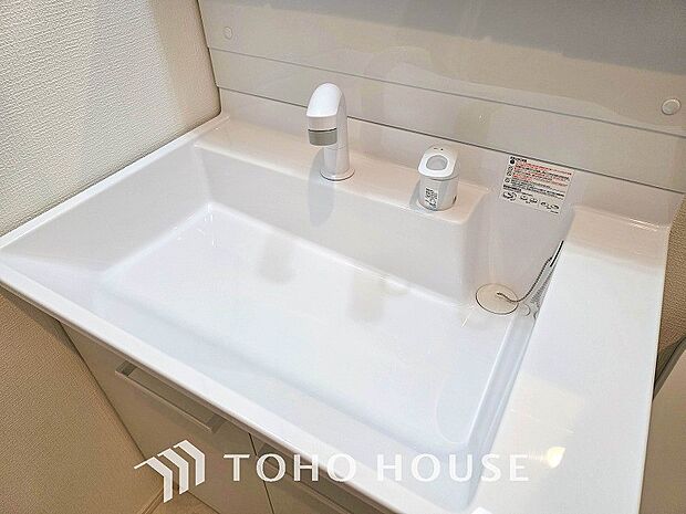 洗面台・洗面所洗面ボウルとカウンターが一体となり、お掃除しやすい洗面化粧台。