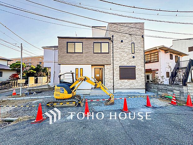 住む人や訪れる人やさしくエスコートする玄関アプローチ。