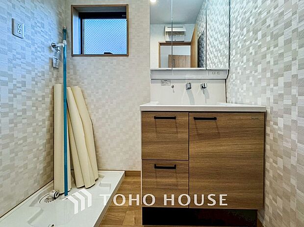 洗面台・洗面所パウダールームはナチュラルな雰囲気で清潔な印象。