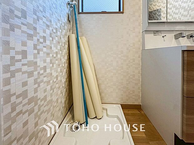 清潔感のあるカラーで統一されたランドリースペース。気持ちの良い空間で家事もはかどります。