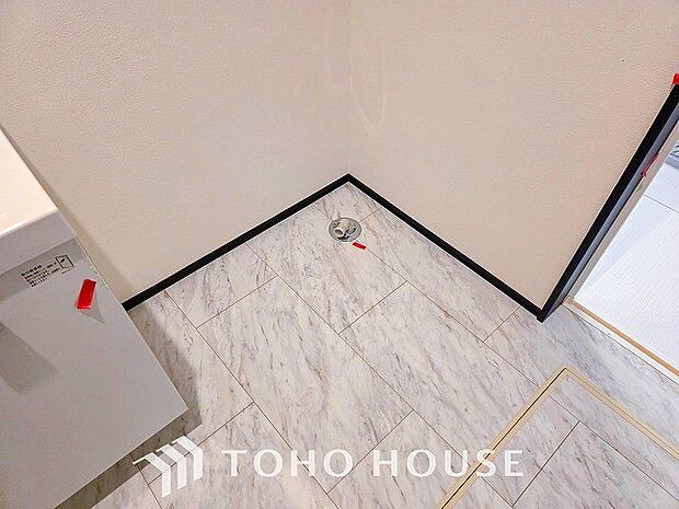 清潔感のあるカラーで統一されたランドリースペース。気持ちの良い空間で家事もはかどります。