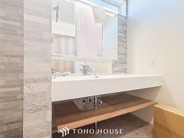 洗面台・洗面所洗面ボウルとカウンターが一体となり、お掃除しやすい洗面化粧台。