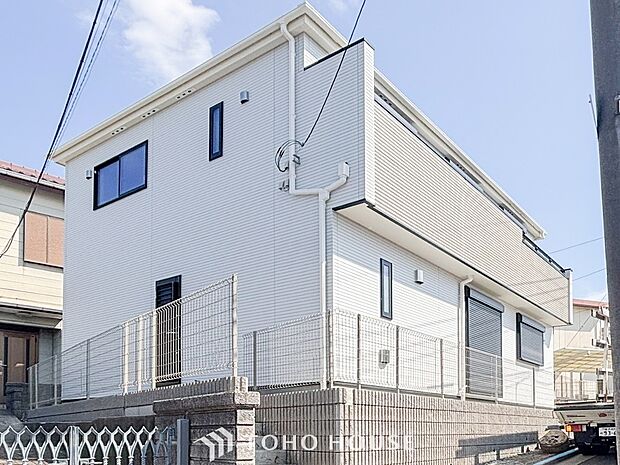 風を感じ解放感あふれる光に満ちた住まい。