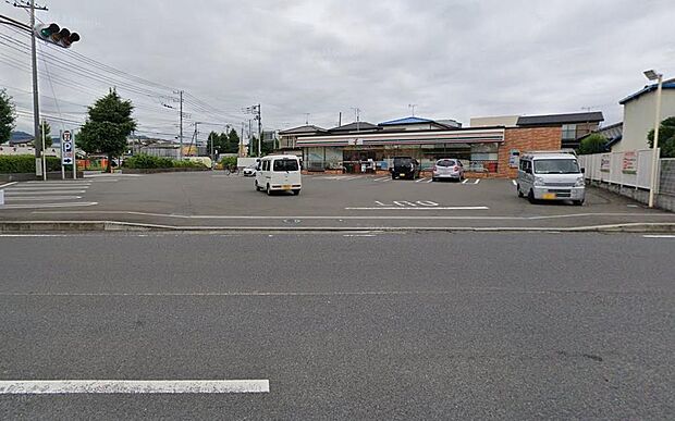 セブンイレブン上依知店